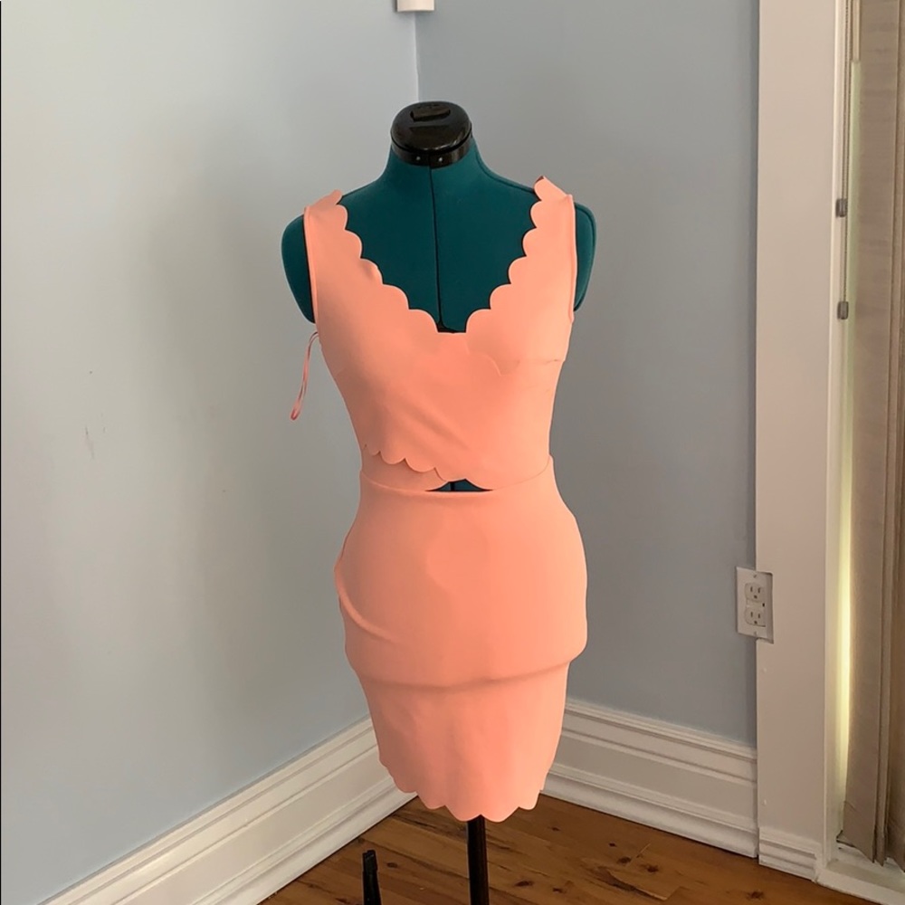 Peach body con dress